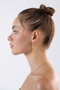 Introducing our exquisite collection of minimalist huggie hoop gold earrings, designed specifically for those who appreciate the allure of understated elegance. Crafted with utmost precision and a touch of sophistication, these earrings are an absolute must-have for any style-conscious individual. With a timeless design that effortlessly blends minimalism with modern aesthetics, these huggie hoop earrings are the perfect accessory to elevate any outfit. The sleek golden hoops hug your earlobe ge I Release, Golden Hoops, Light Jewelry, Contemporary Accessories, Hoop Design, Birthstone Gifts, Huggie Hoop Earrings, Sleek Look, Gold Charm