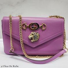 This Limited Edition Gucci Rajah Shoulder Bag Is A Piece Of Wearable Art That Carries The Legacy Of Gucci's Craftsmanship And Splendor. Highlights * Color: Lilac * Material (Outer): Leather * 100% Authentic * Msrp $2980 * Made In Italy * Gold-Tone Hardware * Strap Drop: 20.75" Dimensions: Length: 10.5" | 26.7 Cm Width: 2.75" | 7 Cm Height: 7" | 17.8 Cm Note: Few Light Scratches On The Exterior. Hardly Noticeable. Please See Pics That Have Been Given. Price Is Firm. All Items Are Sanitized Before Highlights Color, Lilac Color, Wearable Art, Gucci Bag, Leather Shoulder Bag, Lilac, Gold Tones, Limited Edition, Bag Lady