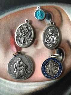 You get all 5 vintage medals pictured in good condition!.. nice small lot for crafting, jewelry making / wear as a pendant or on a charm bracelet! Antique Nickel-free Collectible Charms, Vintage Collectible Charms With Round Pendant, Vintage Nickel-free Charms For Gifts, Vintage Medallion Charms, Vintage Miraculous Medal Round Pendant Jewelry, Vintage Engraved Pendant Charms, Vintage Medallion Charms As Gift, Vintage Medallion Charms As Gifts, Vintage Pendant Charms For Gifts