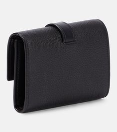 Find LOEWE Anagram Small Leather Wallet on Editorialist. Material: leather. Lining: unlined. Made in Italy. Designer color name: Black. Closure: snap-buttoned fastening. Internal details: Card slots, bill slots, internal zipped pocket. Includes: box, dust bag. Luxury Leather Trifold Wallet For Evening, Luxury Bifold Wallet With Snap Closure, Designer Leather Wallet With Smooth Grain, Designer Leather Trifold Wallet With Card Slots, Designer Leather Trifold Wallet, Designer Black Leather Wallet, Designer Leather Wallet With Magnetic Closure, Designer Leather Wallet With Leather Lining, Modern Leather Wallet With Snap Closure