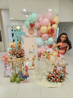 there are many balloons and decorations on display in the store's front room, including a hula girl