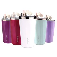 thermos flasks are lined up in different colors and sizes, including one with