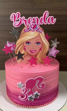 a barbie birthday cake with pink frosting and stars on the top that says brenda