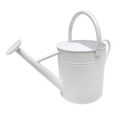 a white watering can with a handle