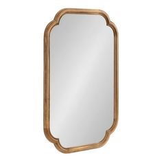 a mirror that is made out of wood and has a wooden frame around the edge