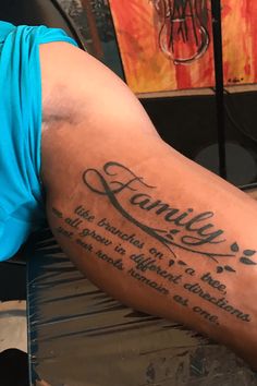 a man with a tattoo on his arm that says, family is the best gift for someone