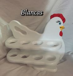 a close up of a chicken shaped object on a white background with the words blancas above it