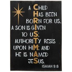 a wooden sign with the words jesus and a star above it that says, a child has been born for us