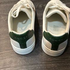 White Gucci Sneakers With White Gucci, Laces And Red And Green Striped Details. The Back Of The Sneakers Have Green Lizard With Gucci And Boston On Them. These Are Brand New Never Worn Out Of The House. Gucci Low-top Sneakers With Perforated Toe Box, Gucci Lace-up Sneakers With Perforations, Sporty Green Gucci Sneakers, Gucci Green Sneakers With Rubber Sole, Gucci Green Lace-up Sneakers, White Gucci Slip-on Sneakers, Gucci Casual Slip-on Sneakers, Green Lizard, Gucci Ace Sneakers