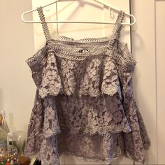 This Purple Grey Cold Should Lace Top With Bell Sleeves Is The Perfect Day To Date Night Top. Beautiful Details With Tank Top Straps So It Won’t Fall Down Purple Lace Tops For Spring, Purple Lace Top For Spring, Bell Top, Top With Bell Sleeves, Top Straps, Night Tops, Printed Sleeveless Blouse, Tank Top Straps, Square Neck Top