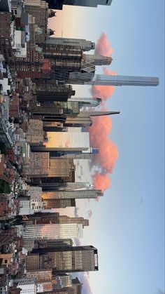 the sky is reflected in the tall buildings