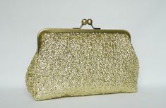 NOTE: ALL OF MY BAGS ARE HANDMADE TO CUSTOMERS INDIVIDUAL ORDERS!! Gorgeous, elegant and sparkly. Beautiful handmade Champagne gold sequin clutch purse, fully lined with satin fabric. Reinforced with heavy weight interlining and interfacing so it maintains its shape. All stress points have been double stitched for durability. The size is perfect to carry your essentials for a day or night out, i.e mobile phones, keys, make-up, credit cards and coins. The purse as well as many others in my collec Wedding Clutch Bag, Gold Sequin Fabric, Wedding Clutch Purse, Bridesmaid Clutches, Clutch Bag Wedding, Wedding Bags, Sequin Clutch, Velvet Clutch, Bridal Bag