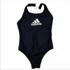 Adidas Girls Crossback One Piece Black White Logo Swimsuit Bikini Swimwear New With Tags Retail: $46 18% Spandex Lined Approximate Measurements: Medium: 11/12 Year Olds 30.5" Chest 27" Waist Large: 13/14 Year Olds 34" Chest 28.5" Waist Ship Daily Cute Bathing Suits For Ages For 10-12, Fitted Black Adidas Swimwear, Cute Bathing Suits For Kids 13-15, Navy Blue Swimwear, Cute Bathing Suits For Kids 10-12 Cross Cut, Adidas Swimsuit, Black White Logo, Black And White Swimsuit, One Piece Black