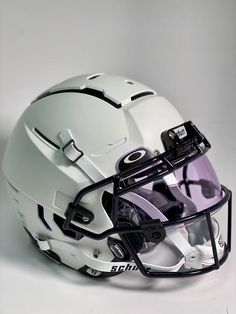 a football helmet is shown on a white background