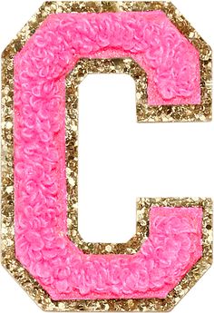 the letter c is made out of pink and gold sequinized paper with glitters