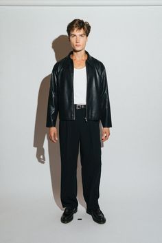 A vintage inspired vegan leather blouson. Our modern interpretation of a wardrobe classic that is both effortlessly cool & elegantly refined. Regular-fit with a slight crop to taper into the waist. Crafted from a buttery smooth, vegan leather that looks and feels like the real thing.