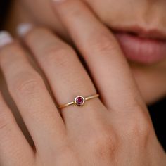 Ruby Ring 14K Gold Dainty Stacking Simple Red Stone Bezel Modern July Birthstone GR00218 A modern and timeless 14K gold ring with a natural Ruby gemstone. A perfect gold ring for women, stacking and minimalist that adds glam to every outfit. 100% handcrafted with love! ● Metal: 14K solid gold ● Gemstone: Natural Ruby ● Stone Diameter: 3.3mm R I N G ∙ S I Z I N G For General Reference: ● we use standard US Ring Sizing ● an average women's ring finger is size 6-7 ● each ring is custom made upon or Ruby Dainty Ring, Gold Ring Red Stone, Red Stone Ring Women, Modern Gold Ruby Ring As Gift, Modern Gold Ruby Ring For Gift, Elegant Emerald Ring With Bezel Setting, Classic Yellow Gold Ruby Ring With Round Stone, Ruby Birthstone Ring With Round Stone, Modern Ruby Rings With Bezel Setting