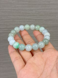 > 100% Untreated Natural Grade A Jadeite Jade from Myanmar. It is Safe and Good for Your Skin, Health, and Luck. Its Value Has Been Significantly Increased from the past years. > Jade from Myanmar/ Burmese, Guarantee 100% A Jadeite! > Shape and Cut: Round Beaded > Beads Dimensions (mm): ~10mm > with Certificate  > Weight (g): 42.8 > Color: Untreated Natural Multicolor > Free standard shipping from Hong Kong with tracking included. > Take approximately 7-21 days to arrive worldwide. > DUE TO THE Beaded Beads, Diffuser Bracelets, Jade Bracelet, Bracelet Beaded, Burmese, 21 Days, Type A, Skin Health, Round Beads