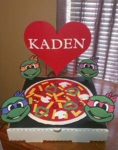 a cake that has been made to look like a pizza with the name kaden on it