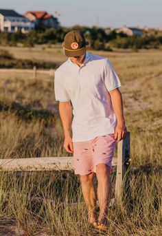 These shorts will take you everywhere, straight from the golf course to the boat, to a summer soirée. Match your family or friends in these shorts made for the Dads and the Chads. You will want to collect them all! Designed on Nantucket 8" inseam Plain front Button closure, zip fly Tailored fit Imported Fabric Made in the Dominican Republic White Summer Bermuda Shorts For Beach, White Cotton Summer Bottoms, White Cotton Bottoms For Warm Weather, Cotton Bermuda Swim Trunks For Summer, Summer Bermuda Cotton Swim Trunks, Casual White Bermuda Shorts For Vacation, White Cotton Shorts For Summer Outings, White Cotton Golf Bottoms, White Golf Bottoms For Summer