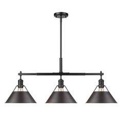 three lights hanging from the ceiling in an industrial style fixture with black metal fixtures and shades