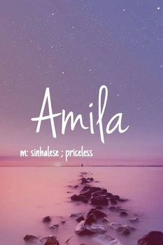 an image of the ocean with rocks in front of it and the words amila written on