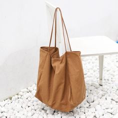 Detail: Item Type: Handbag Material: Canvas Closure Type: None Style: Casual, Daily Size: Length: 40.00 cm/ 15.75 " Width: 22.00 cm/ 8.66 " Height: 35.00 cm/ 13.78 " Simple Everyday Canvas Shoulder Bag, Minimalist Beige Bags For Everyday Use, Simple Everyday Hobo Shoulder Bag, Simple Beige Shoulder Bag For Everyday, Simple Everyday Hobo Tote Bag, Minimalist Large Capacity Everyday Bag, Simple Canvas Shoulder Bag For Travel, Minimalist Large Capacity Shopping Bags, Minimalist Beige Tote Hobo Bag