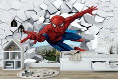 a bedroom with a spider man wall mural