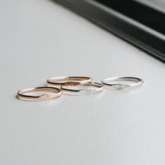 A Dainty Tiny Signet Ring, customised with a letter/initial of your choosing. The perfect ring for stacking! Each letter is hand stamped in our 1.5mm tiny block font (uppercase only). Available in sizes 2 US to 15 US Need help with sizing? Look at our size guide or purchase our ring sizer Due to its handmade nature, there may be some colour variances where the solder seam is Each Stamp + Shine piece is made from scratch in our little studio in Melbourne, Australia. The process begins with a clea Dainty Rings With Initials For Everyday, Dainty Everyday Rings With Initials, Simple Stackable Initial Ring For Everyday, Adjustable Initials Stackable Rings For Everyday, Everyday Adjustable Stackable Rings With Initials, Classic Personalized Midi Rings For Everyday, Minimalist Stackable Initial Ring For Anniversary, Minimalist Signet Ring With Initials, Minimalist Stackable Initial Ring For Promise