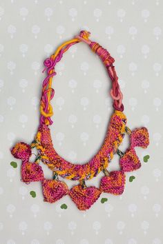 Colorful tribal necklace fiber statement jewelry unique Bohemian Pink Crochet Jewelry, Handmade Artisan Pink Necklaces, Artisan Pink Beaded Necklace For Festivals, Handmade Bohemian Pink Necklace, Handmade Pink Bohemian Necklace, Unique Pink Beaded Necklaces For Festival, Unique Pink Beaded Necklace For Festival, Pink Crochet Bohemian Necklace, Unique Pink Necklace For Festivals