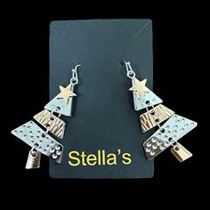 Stella’s Local Shop Christmas Tree Pierced Earrings 3” Goldtone & Silvertone Tiered Dangling Hook Fashion Jewelry Brand New With Tag Dark Red Organza Gift Bag Included Star-shaped Metal Earrings With Dangling Charms, Jewelry Christmas Tree, Local Shop, Jewelry Brand, Organza Gift Bags, Pierced Earrings, Organza Bags, Earings Piercings, Jewelry Branding