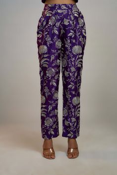 Editor's Note These gorgeous coordinate narrow pants feature a contemporary mix of strong floral butta with a geometric jaal, delicately enhanced with tiny motifs in silver foil. The ensemble exudes a young and fun aura. Personal Shopping Service, Purple Pants, Indo Western, Silver Foil, Custom Tailoring, Indian Design, Western Outfits, Handmade Clothes, Personal Shopping