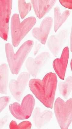 watercolor hearts on yellow and pink checkered paper with the word love written in it