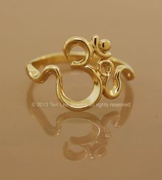 Om Sweet Om  Ring  Gold by TeriLeeJewelry on Etsy Hamsa Ring, Pear Cut Engagement Rings, Divine Energy, Leaf Engagement Ring, Men Rings, Om Symbol, Gold Rings Jewelry, Ringe Gold