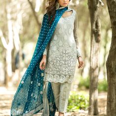 This Beautiful Silver Chiffon Shirt With All Over Embroidered Motifs, Embellished Neckline And Beautiful Cutout Damaan Is Perfect For This Season. It Comes With A Teal Dupatta And Jamawar Pants. Sleeves Lining Added Shirt Length Customize Jamavar Pants, Orang India, Zainab Chottani, Nikkah Dress, Punjabi Outfits, Gaun Fashion, Salwar Kamiz, Desi Clothes, Pakistan Fashion