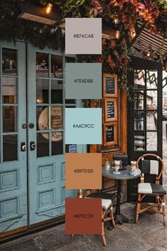 an outdoor cafe with blue doors and wooden tables in front of it, along with various colors of paint swatches