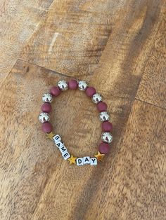 Crimson & silver game day bracelet Silver Beaded Bracelet, Silver Bead Bracelet, Game Day, Arm Band, Beaded Bracelet, Beauty Book, Jewelry Bracelets, Accessory Gift, Beaded Bracelets