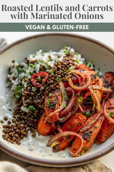 roasted lentils and carrots with marinated onions in a bowl on top of rice