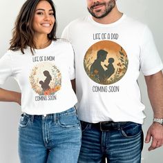 Celebrate the exciting journey of parenthood with these beautifully designed matching "Life of a Mom" and "Life of a Dad" shirts! Featuring charming, nature-inspired silhouettes and a "Coming Soon" announcement, these tees are perfect for expecting parents. Whether you're planning a pregnancy reveal, a baby shower, or simply want to show off your growing family, these shirts are a stylish and heartwarming way to share the news. Product Features: Design: "Life of a Mom" and "Life of a Dad" with baby silhouettes Material: Soft and breathable cotton blend Perfect for: Pregnancy announcements, baby showers, family photoshoots, maternity wear Sizes: Small to 3XL Color Options: White Make these special moments even more memorable with this thoughtful and creative matching set! A wonderful gift f Baby Silhouette, Dad Shirts, Expecting Parents, Pregnancy Reveal, Dad Life, Pregnancy Reveals, Gifts For New Parents, Growing Family, Maternity Wear