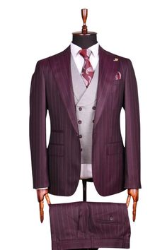 Made from 220s Wool Fabric Turn heads with this luxurious burgundy pinstripe three-piece suit, a perfect blend of classic sophistication and contemporary style. Featuring a sleek jacket, a double-breasted gray vest, and matching trousers, this suit is ideal for weddings, business events, or any formal occasion. The rich burgundy fabric with elegant pinstripes creates a timeless and striking look, while the tailored fit ensures a polished silhouette. Features: - Rich burgundy fabric with elegant pinstripe design - Three-piece set: jacket, trousers, and gray double-breasted vest - Slim-fit tailoring for a modern and refined appearance - Functional pockets and notch lapel design - Perfect for weddings, corporate events, or upscale occasions What's Included: - Burgundy pinstripe suit jacket - English Hunting Outfit, English Hunting, Hunting Outfit, Mens Wedding Suits, Modern Tailor, Double Breasted Vest, Gray Vest, Lapel Design, Burgundy Fabric