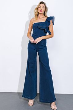 Indulge in the luxury of a denim jumpsuit with a sophisticated one shoulder neckline, elegant ruffled sleeve and front detail, and a wide leg design. The back zipper closure adds a touch of exclusivity to this garment.Details:Self : 75% Cotton 23% Polyester 2% SpandexSize & Fit- Model is 5`8" And Wearing Size Small- Measurements Taken From Size Small- Approx. Length: 61" Luxury Women's Spring Denim Jumpsuit, Luxury Denim Jumpsuit With Pockets For Spring, Luxury Blue Denim Jumpsuit For Spring, Luxury Women's Denim Jumpsuit For Spring, Cheap Chic Denim Blue Jumpsuit, Affordable Chic Medium Wash Denim Jumpsuit, Luxury Spring Denim Jumpsuit With Pockets, Chic Luxury Denim Jumpsuit For Spring, Luxury Chic Denim Jumpsuit For Spring