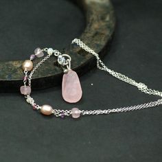 "Simple and elegant Pink Rose Quartz necklace in Sterling Silver Delicate single gem necklace featuring beautiful Rose Quartz - Complimented by a pink color gemstone beads wrapped with high quality Sterling Silver wire, completed with a delicate Sterling Silver chain. The necklace opens and closes from the front with toggle clasp. This is an elegant and feminine, chic handmade necklace, great for layering, perfect for special occasion, wedding, holidays or as a Gift for Her. Rose Quartz is the g Elegant Pink Sterling Silver Crystal Necklace, Elegant Pink Single Strand Crystal Necklace, Pink Sterling Silver Crystal Gemstone Necklace, Elegant Pink Rose Quartz Crystal Necklace, Pink Rose Quartz Single Strand Necklace, Pink Single Strand Rose Quartz Necklace, Pink Rose Quartz Gemstone Necklaces, Pink Rose Quartz Gemstone Necklace, Pink Rose Quartz Single Strand Jewelry