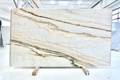 a large white marble slab in a warehouse