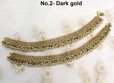 * Adjustable light weight Crystal pair of anklets/payal jewelry. *Comfortable & Light in weight. * 10 inches length. * Adjustable for anybody Ankle. *No.1 *Width- 1.1 inches (Included drops) *No.2 *Width- 1 inches ( Included drops) *No.3 *Width- 1 inches ( Included drops) Gold Anklets With Stone Work For Festivals, Bollywood Style Anklets For Diwali Gift, Bollywood Style Anklets As Gift, Festive Gold Anklets With Stone Work, Jewellery Traditional, Bracelet Indian, Foot Bracelet, Adjustable Lighting, No. 2