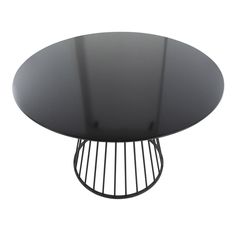 a round table with black glass top and metal frame around the base, on an isolated white background