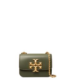 Directly from Tory Burch - Signature hardware, scaled-up in sculptural brass. The Eleanor Small Bag is a structured shape in soft Italian leather - with edges that are painted by hand, to emphasize the clean lines. Its twisted rope chain is convertible: wear it doubled or long and crossbody. Tory Burch Official Site. Womens Designer Bags, Womens Designer Handbags, Designer Clutch, Tory Burch Handbags, Signature Hardware, Designer Shoulder Bags, St Kitts And Nevis, Chain Bags, Rope Chain