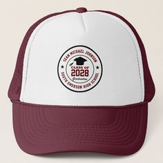 a maroon and white trucker hat with the seal of 2080 written on it