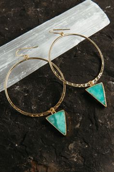 "The green Chrysoprase pendants are to die for. The shade of green is fresh, happy and full of joy. Want to complete an outfit and make it fierce?! Put these beauties on. ▲ Chrysoprase gemstone triangle pendants ▲ 2\" gold plated hoops ▲ Weight: 1/8 oz ▲ Drop length: 3 1/4\" ▲ Handmade in Arizona Love hoop earrings as much as we do? Shop them all here! https://etsy.me/3txKbEn CHRYSOPRASE GEMSTONE PROPERTIES This is a heart stone, promoting joy and optimism! It helps to attract love and abundance Handmade Hoop Jade Jewelry, Green Gemstone Small Hoop Jewelry, Handmade Jade Hoop Jewelry, Green Jade Hoop Jewelry, Gold Jade Hoop Jewelry, Green Gemstone Dangle Hoop Earrings, Small Green Pierced Hoop Earrings, Green Pierced Hoop Earrings, Turquoise Hoop Metal Jewelry