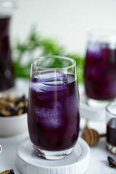 a close-up of a glass of butterfly pea tea