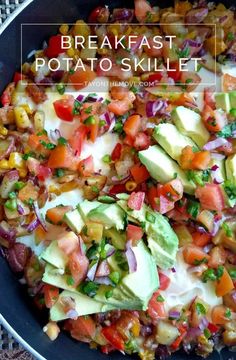 a skillet filled with potatoes, tomatoes and avocado in the center is text overlay that reads breakfast potato skillet